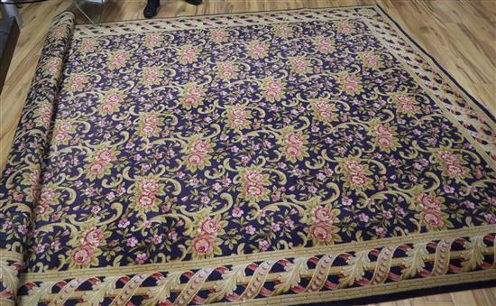 An Aubusson style blue ground carpet 350 x 260cm